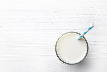 Glass of milk from top view