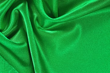 Natural green satin fabric texture background