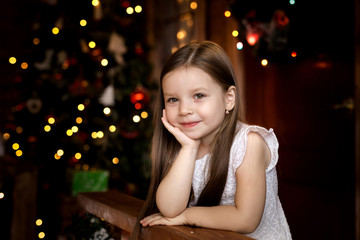 On Christmas night a little girl waiting for Santa Claus.
