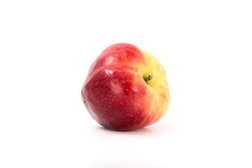 a large red ripe apple on white. Studio.
