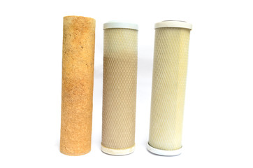 Used water filter cartridges with sediment deposit