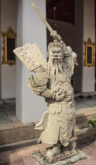 Obraz premium Sandstone doll at Wat Pho that is a Buddhist temple complex Chinese and Thai style in Bangkok, Thailand