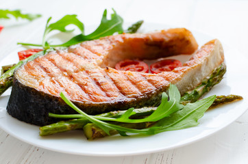 Grilled salmon steak with vegetables