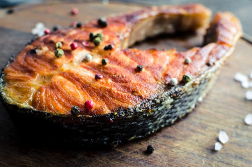 Grilled salmon on cutting board