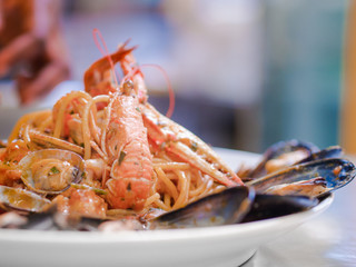 Gourmet seafood pasta with clams and langoustine