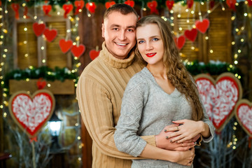 husband and wife celebrate valentine's day. they hugging and smiling. Concept of happy valentine's day