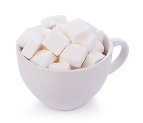 Fototapeta na wymiar sugar cube in cup on white background