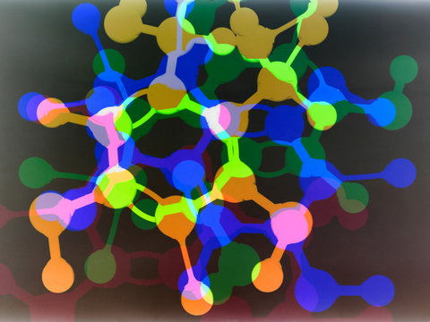 Multi exposure photogram of molecular structure of a formula, illustrating pure research