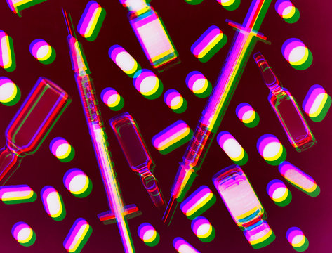 Multi exposure photogram with variety of medicine and syringes illustrating healthcare