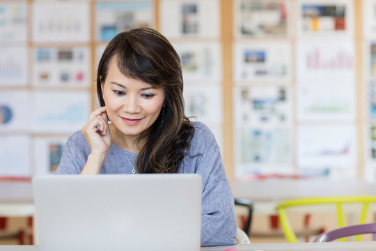 Woman working at laptop