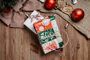 Christmas gifts on a wooden background