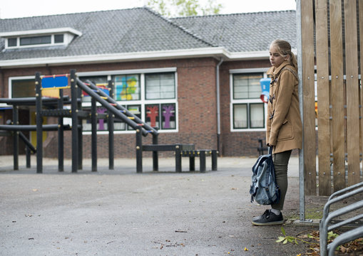 Sad Lonely Girl At Schoolyard