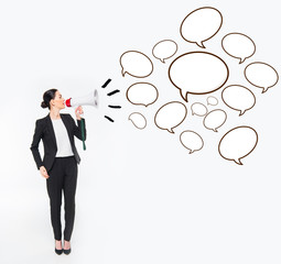 Businesswoman holding megaphone