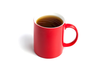 Red cup of tea on white background.