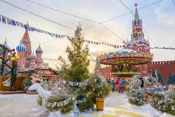 View of Kremlin and Cathedral of St. Basil at the Red Square decorated for New Year and Christmas...