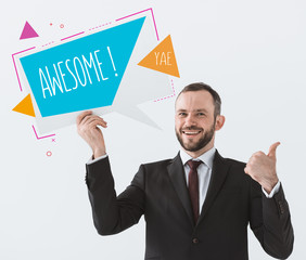 businessman showing card with sign Awesome