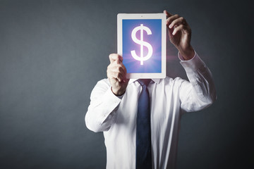 at the businessman instead of a head the tablet on which the image of a dollar symbol