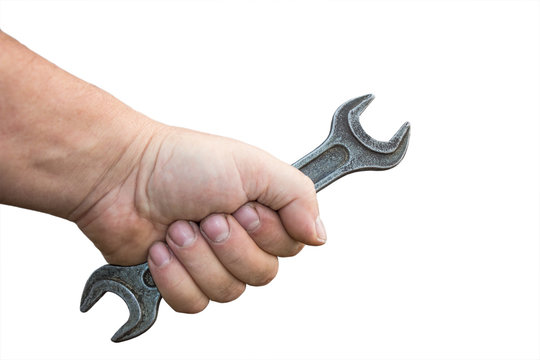 Wrench in male hand isolated on white background