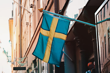 sweden flag in stockholm, gamla stan