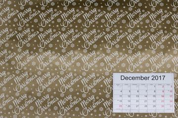 Christmas background with a calendar of December 2017. Here space for your great words.