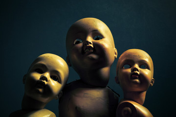 Three creepy dolls