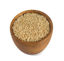 brown rice in a wooden bowl