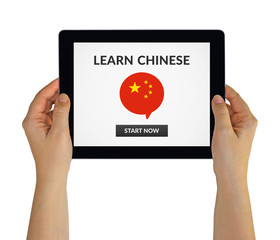 Hands holding tablet with learn Chinese concept on screen. Isolated on white. All screen content is designed by me