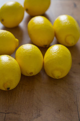 lemons on wooden surface