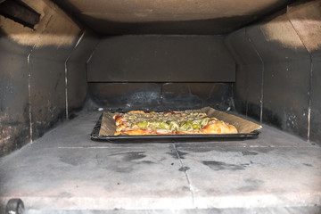 Pizza in a traditional way, homemade, Pizza in wooden oven