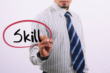 Business concept handwriting marker and write Skill isolated on white.Business quote