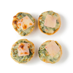 Pie with spinach, cheese and egg isolated on white background