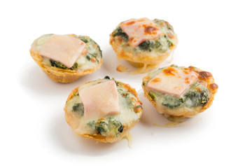 Pie with spinach, cheese and egg isolated on white background