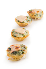 Pie with spinach, cheese and egg isolated on white background
