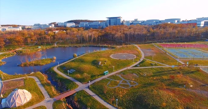 Campus of Russian Far Eastern Federal University. Territory of university with park, lake and sports ground. Aerial view. Vladivostok, Russia.
