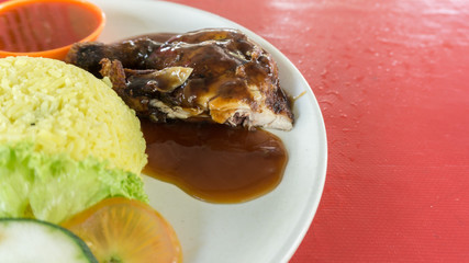 chicken rice, malaysian food with soup and chilies source