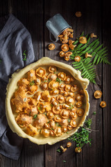 Homemade and rustic tarts with noble mushrooms and thyme