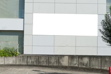 Large blank billboard on a street wall, banners with room to add your own text