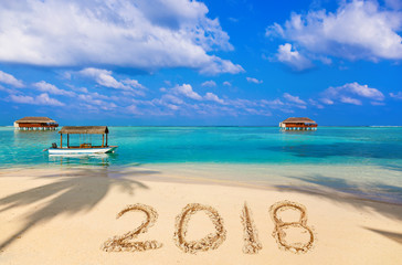 Fototapeta premium Numbers 2018 on beach