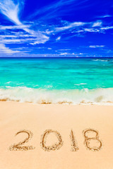 Fototapeta na wymiar Numbers 2018 on beach