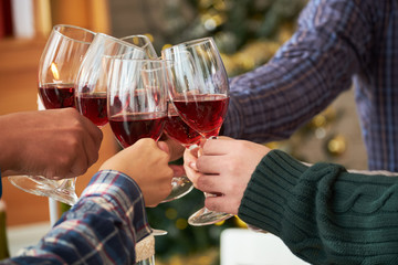 Clinking wine glasses