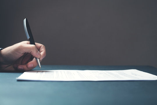 Hand signing contract