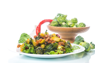 Brussels sprouts fried with beans close-up