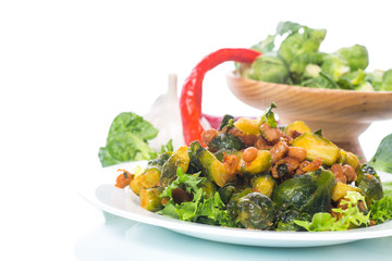 Brussels sprouts fried with beans close-up