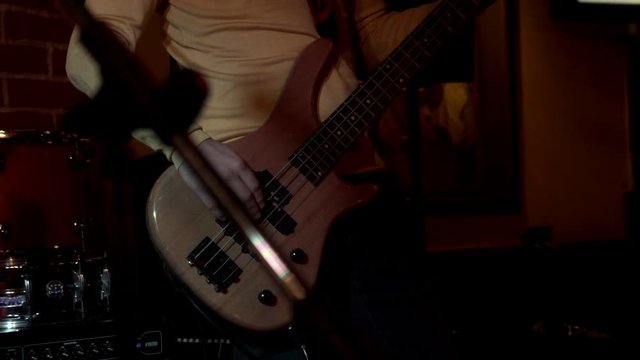 Rock musician plays solo on electric guitar. Playing hands on rock guitarist