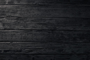 Wooden dark texture background. Free space for your text. Top view.