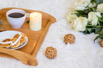 Breakfast. Lunch. Pancakes with cream. Candle and coffee. Cup of coffee with pankaces