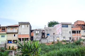 Fototapeta na wymiar Favela in Sao Paulo suburb, Brazil. A lot of small poor houses
