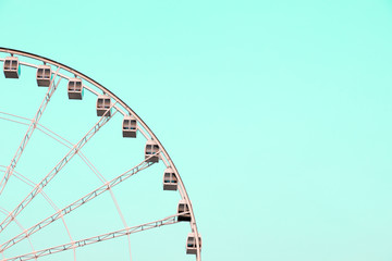 Ferris wheel on turquoise