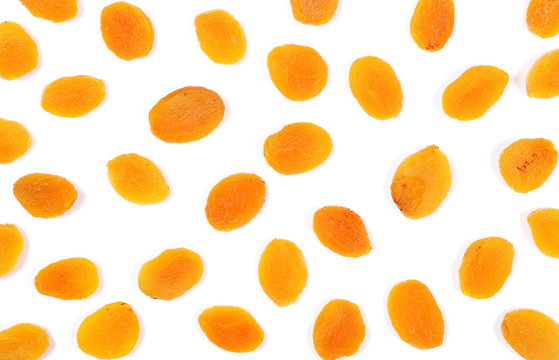 Dry apricots isolated on white background, top view
