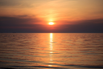 Sea Sunrise with clouds and waves